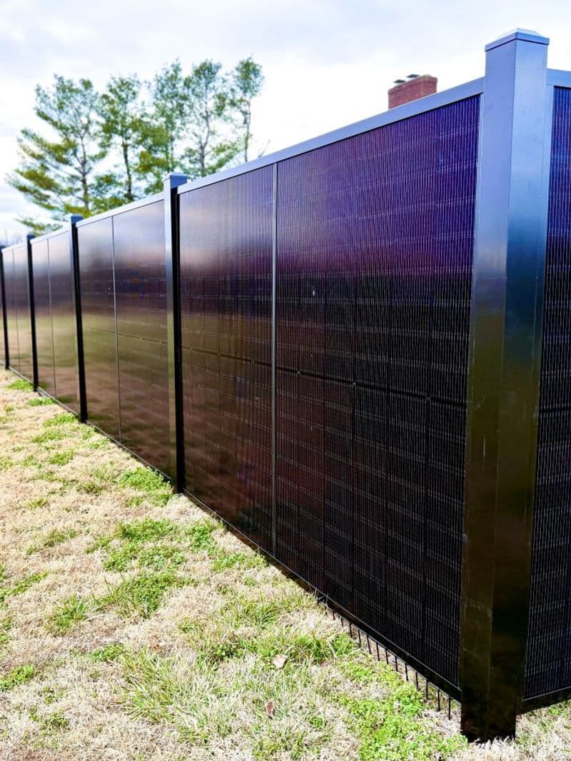 SOL Fence corner installation showing bifacial panel detail